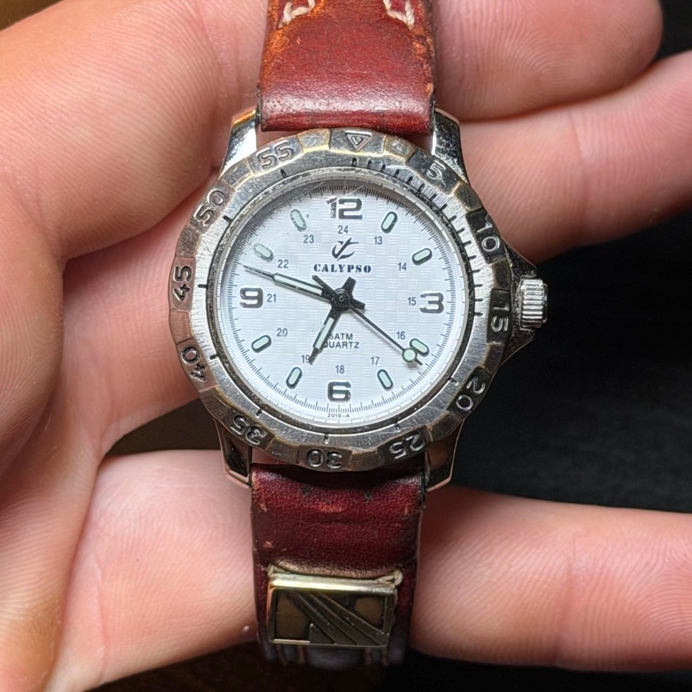 Calypso watch with white face and silver accents #calypso #timepiece